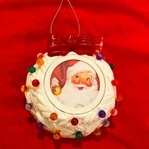 Christmas ornament; record a message. Lights up